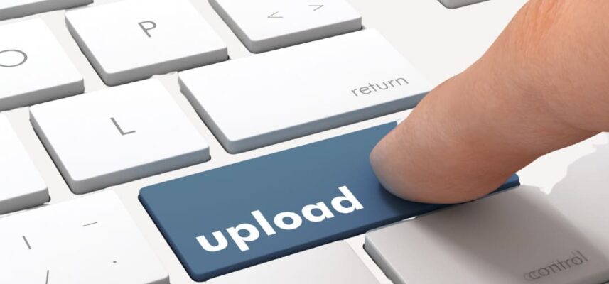 An AI generated image of a finger about to press upload on a keyboard