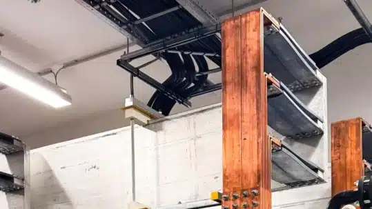 Copper busbars installed in an electrical switchboard, showing why busbars need electroplating to improve conductivity and prevent corrosion